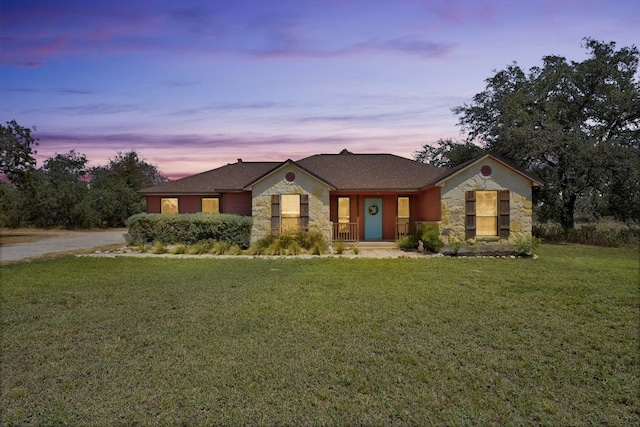 view of front of home with a yard