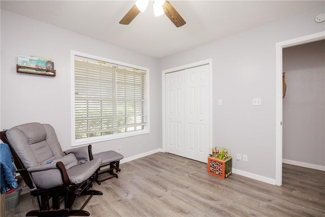 537 Vista Dr, Odem, TX 78370 - living area with wood finished floors, ceiling fan, and baseboards