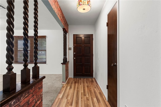 corridor featuring light hardwood / wood-style flooring