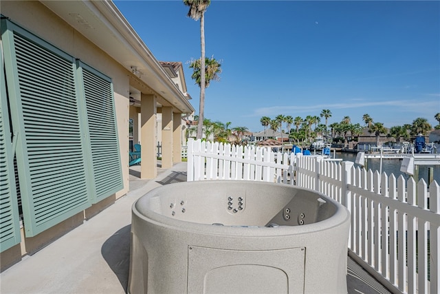 view of patio / terrace featuring a water view