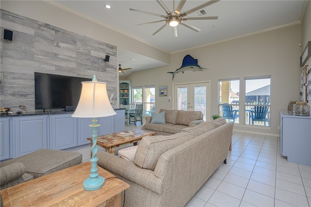 living room featuring ornamental molding, light tile patterned flooring, french doors, and ceiling fan