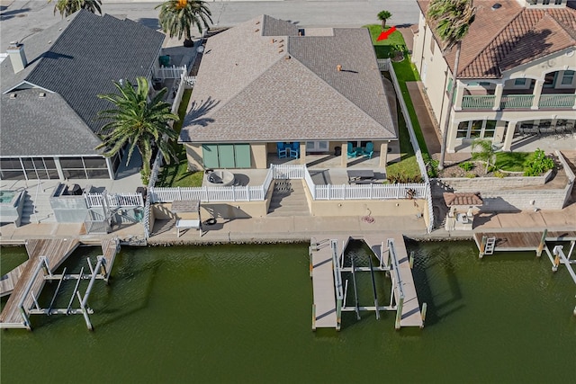 dock area with a patio area and a water view