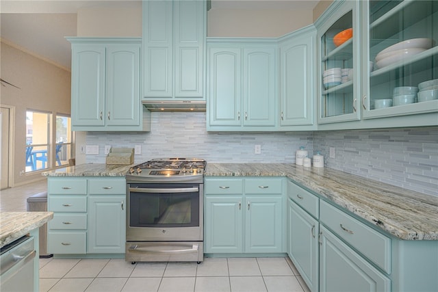 kitchen with light tile patterned flooring, appliances with stainless steel finishes, ornamental molding, tasteful backsplash, and light stone countertops