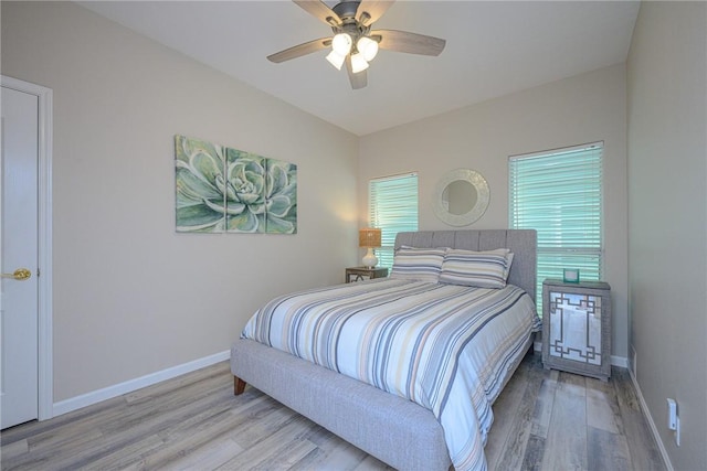 109 Redfish Ct, Aransas Pass, TX 78336 - bedroom featuring wood finished floors, baseboards, and a ceiling fan