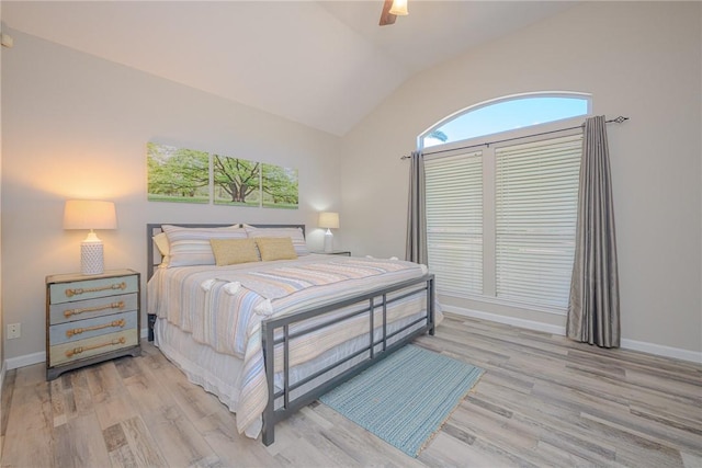 109 Redfish Ct, Aransas Pass, TX 78336 - bedroom featuring vaulted ceiling, light wood-style floors, baseboards, and ceiling fan