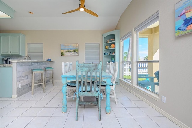109 Redfish Ct, Aransas Pass, TX 78336 - dining room with ceiling fan, light tile patterned floors, and baseboards