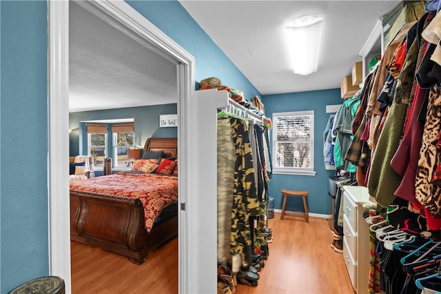 walk in closet featuring light hardwood / wood-style floors