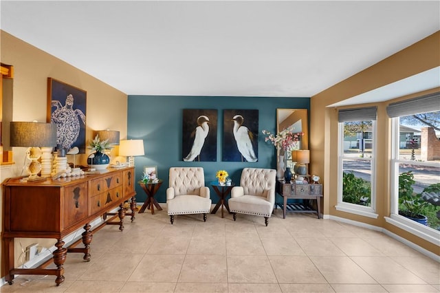 living area featuring light tile patterned flooring