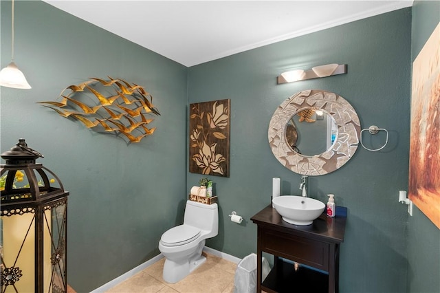 bathroom with tile patterned floors, vanity, and toilet