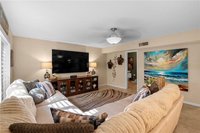 living room with ceiling fan