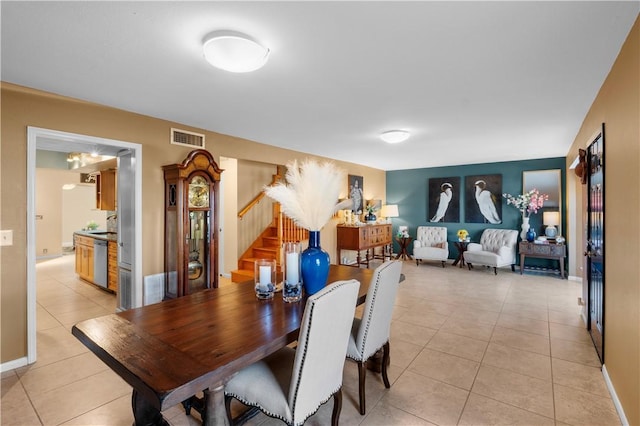 dining room featuring light tile patterned floors