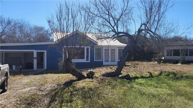 view of home's exterior featuring a lawn