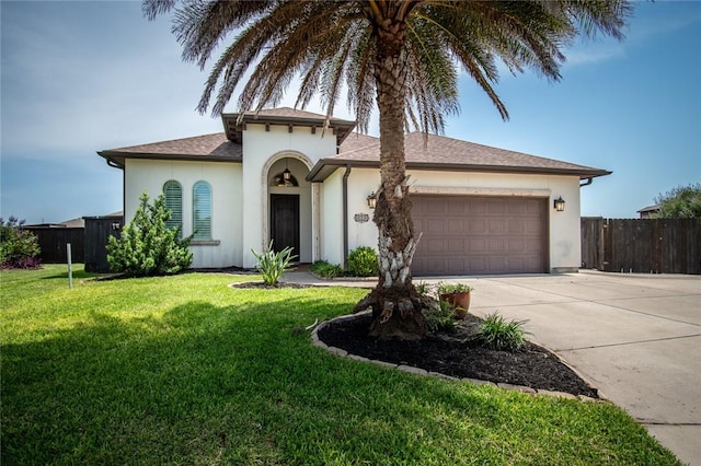 8054 Calgary Dr, Corpus Christi, TX 78414 - mediterranean / spanish-style home with stucco siding, a garage, and concrete driveway