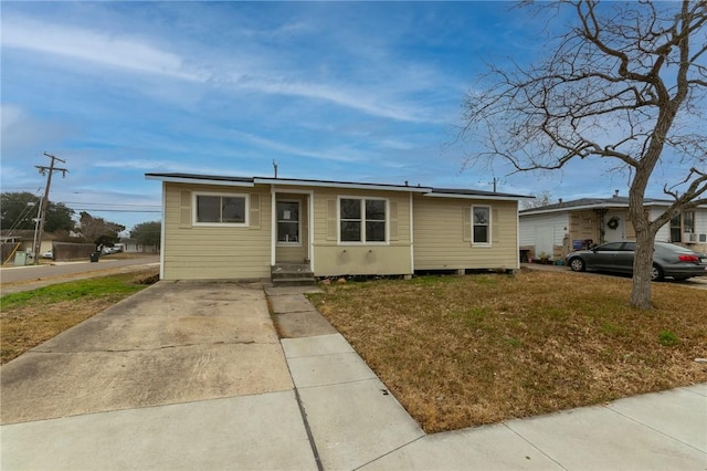 4602 Salazar St, Corpus Christi, TX 78416 - view of front of house with a front lawn