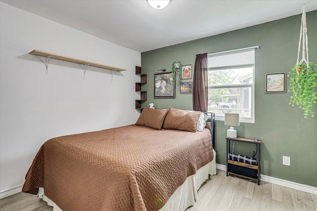 bedroom featuring light hardwood / wood-style flooring