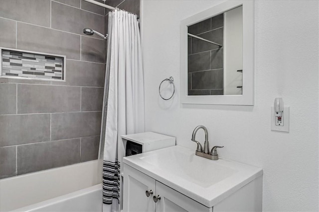 bathroom featuring shower / bath combination with curtain and vanity