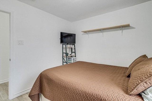 bedroom featuring light hardwood / wood-style floors