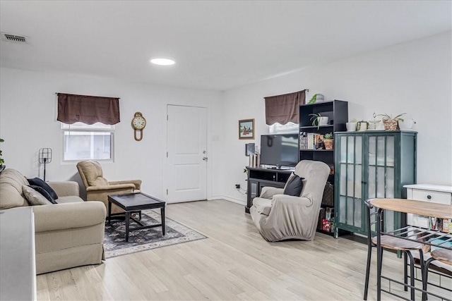 living room featuring light wood-type flooring