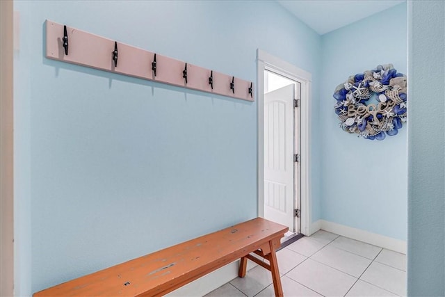 mudroom with light tile patterned floors