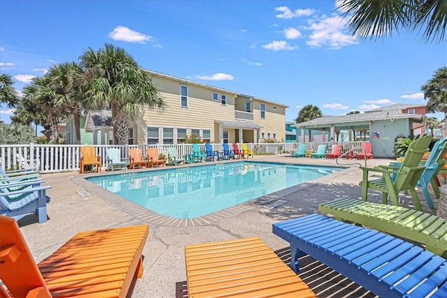 view of swimming pool with a patio