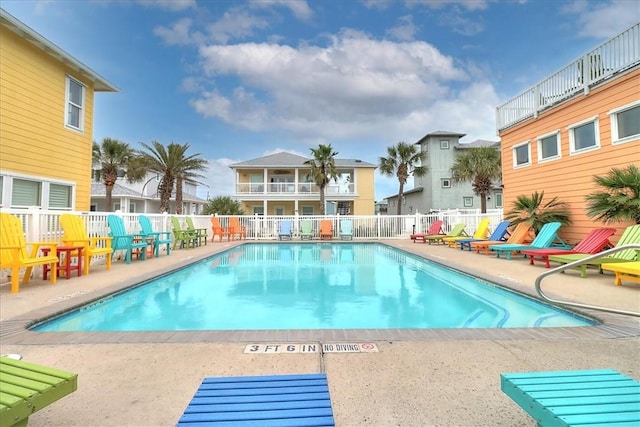 view of pool featuring a patio