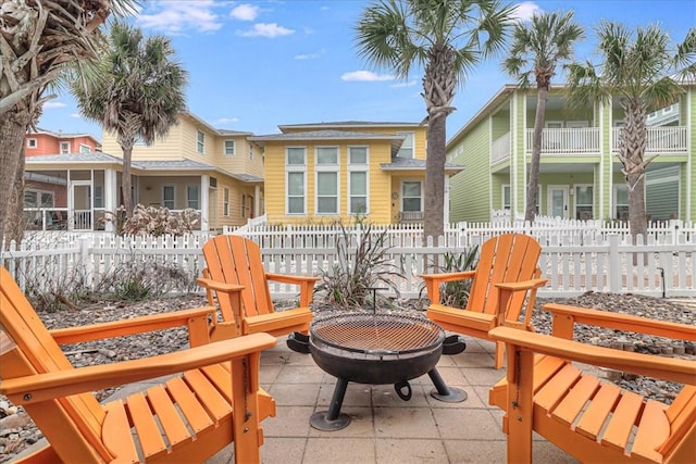 exterior space with an outdoor fire pit