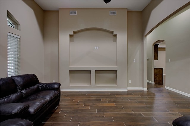 living room with dark hardwood / wood-style floors