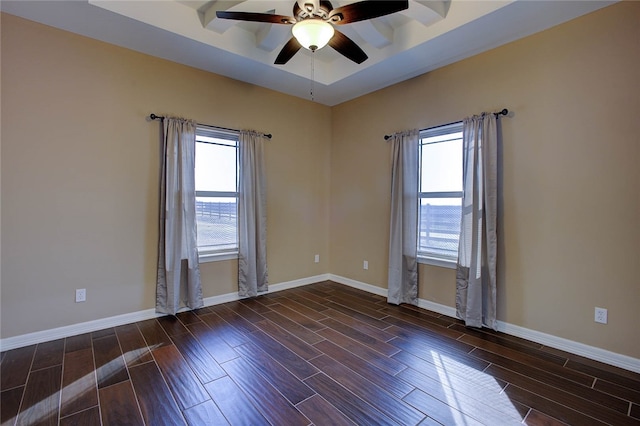 unfurnished room featuring ceiling fan and dark wood-type flooring