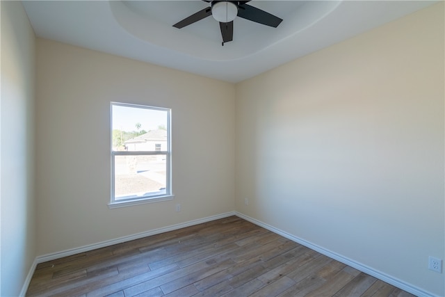 unfurnished room with ceiling fan and light wood-type flooring