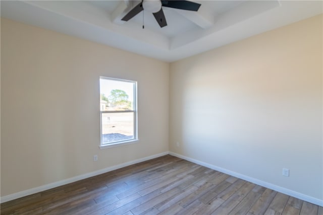 empty room featuring ceiling fan and light wood-type flooring