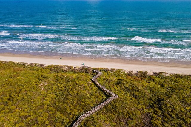 aerial view featuring a water view and a view of the beach