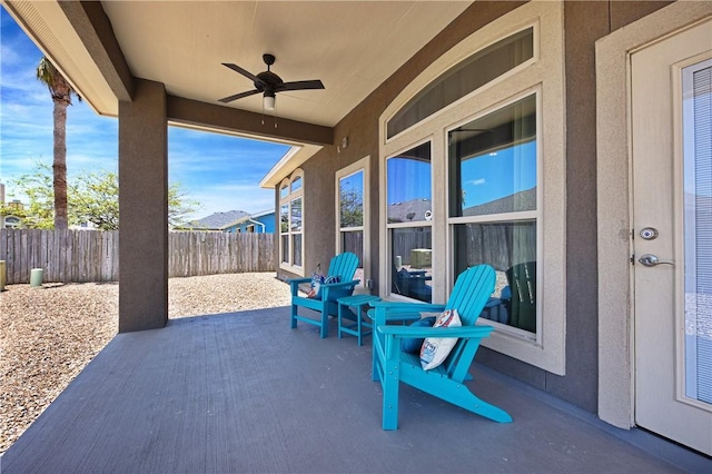 view of patio / terrace with ceiling fan and a fenced backyard