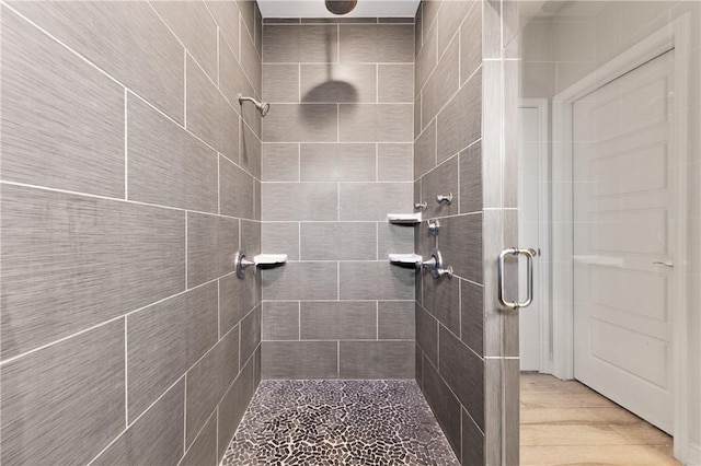 bathroom with a shower stall