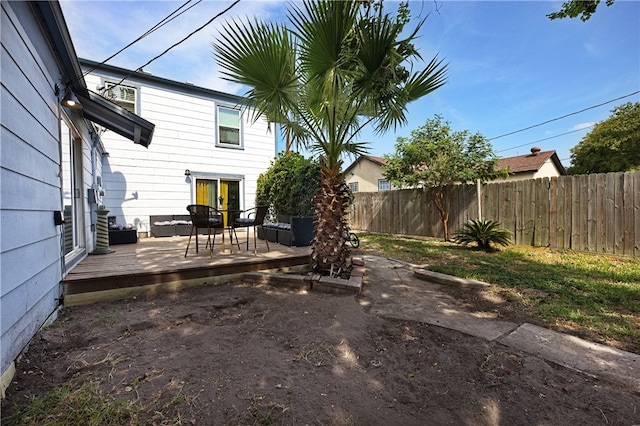 view of yard with a wooden deck