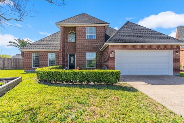 traditional-style house with brick siding, a front lawn, fence, a garage, and driveway