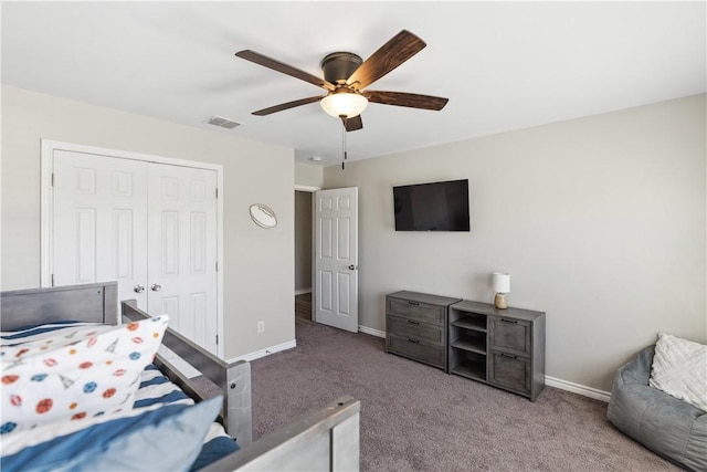 bedroom featuring visible vents, baseboards, carpet, a closet, and a ceiling fan