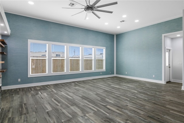 unfurnished living room featuring dark hardwood / wood-style floors, ceiling fan, plenty of natural light, and ornamental molding