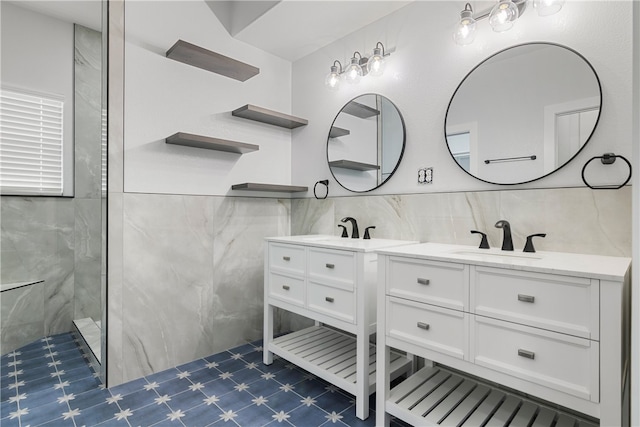 bathroom with a tile shower, decorative backsplash, and vanity