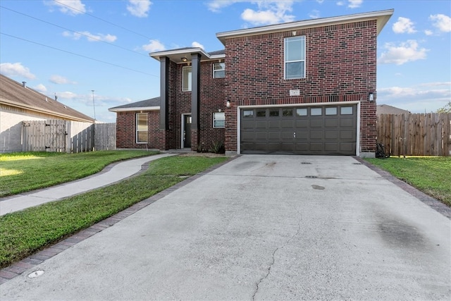 front of property with a garage and a front lawn