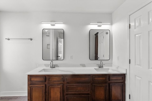 bathroom featuring vanity and wood-type flooring