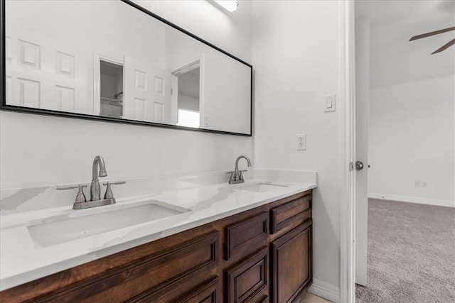 bathroom with vanity and ceiling fan