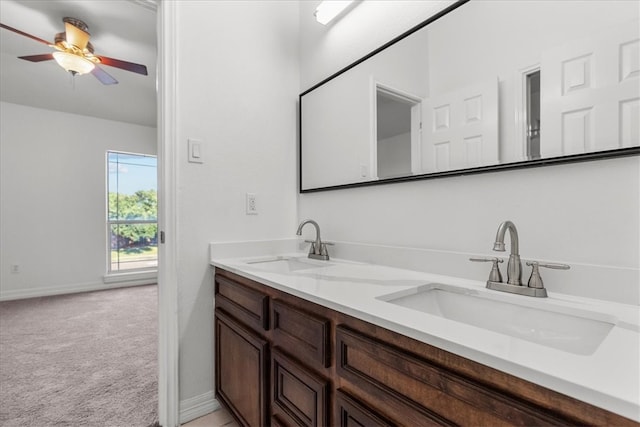 bathroom featuring vanity and ceiling fan