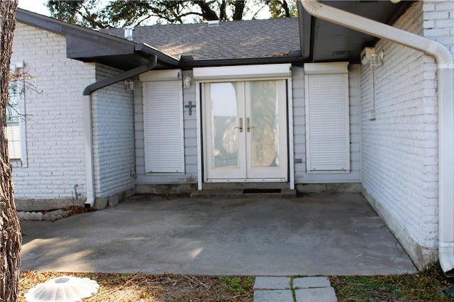 doorway to property with a patio and french doors