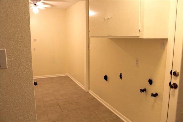 laundry area with cabinets and hookup for an electric dryer