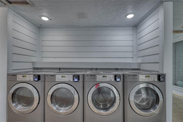 3938 Surfside Blvd Unit 2201, Corpus Christi, TX 78402 - communal laundry room with independent washer and dryer
