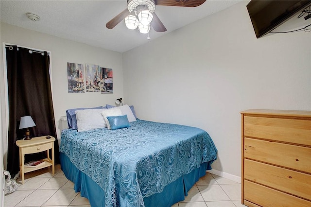 3938 Surfside Blvd Unit 2201, Corpus Christi, TX 78402 - bedroom with light tile patterned flooring and a ceiling fan
