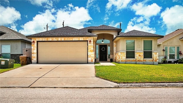 7209 Lake Tranquility Dr, Corpus Christi, TX 78414 - view of front of house with stone siding, driveway, a garage, and a front yard
