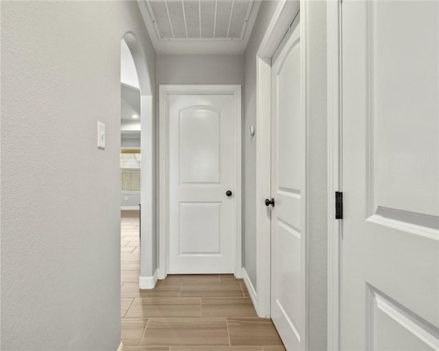 7209 Lake Tranquility Dr, Corpus Christi, TX 78414 - corridor featuring wood tiled floors and baseboards
