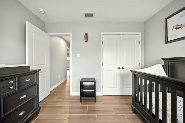 7209 Lake Tranquility Dr, Corpus Christi, TX 78414 - bedroom with a closet and wood finish floors