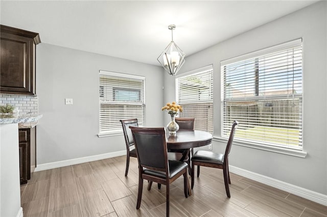 7209 Lake Tranquility Dr, Corpus Christi, TX 78414 - dining space with a chandelier and light wood finished floors